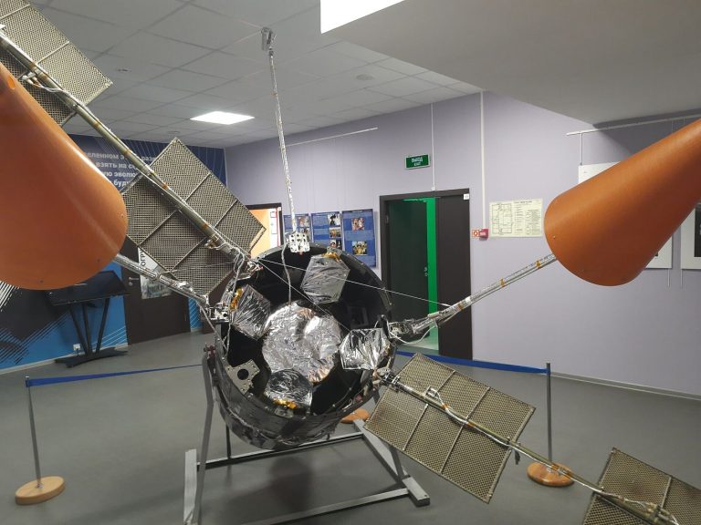 communications satellite orbiting above Earth