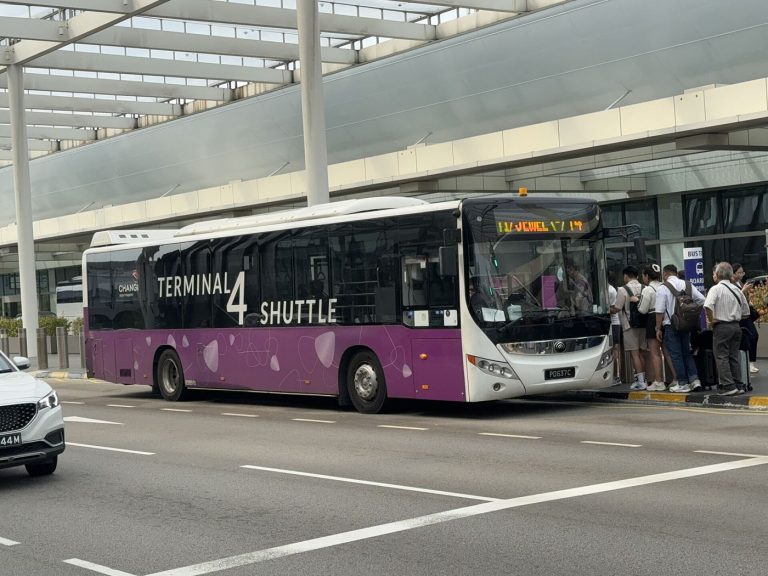 Airport Shuttle Service Increases Frequency for Travellers shuttle bus outside airport terminal