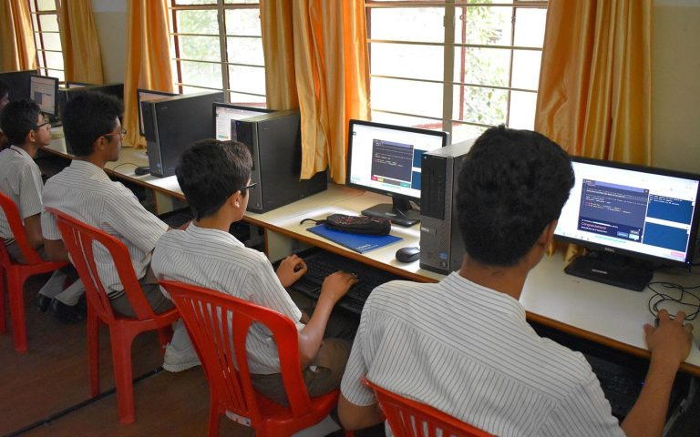 Crypto Literacy Joins Personal Finance Classes Students in a classroom