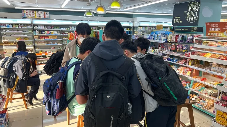 Age Checks Online: How Mexico’s Minor-Safety Push Tests Privacy and Protection High school students with backpacks gathered inside a convenience store
