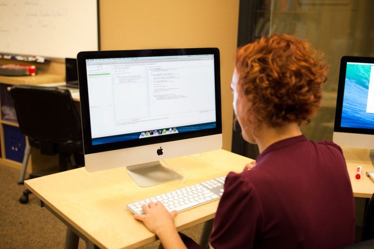 A developer building software on a computer screen